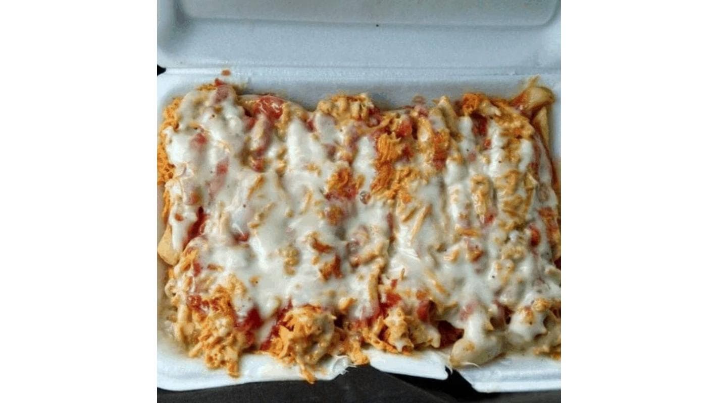 Dominican Loaded Fries ( Yaroa Dominicana de Papa ) at Rico Pica Pollo