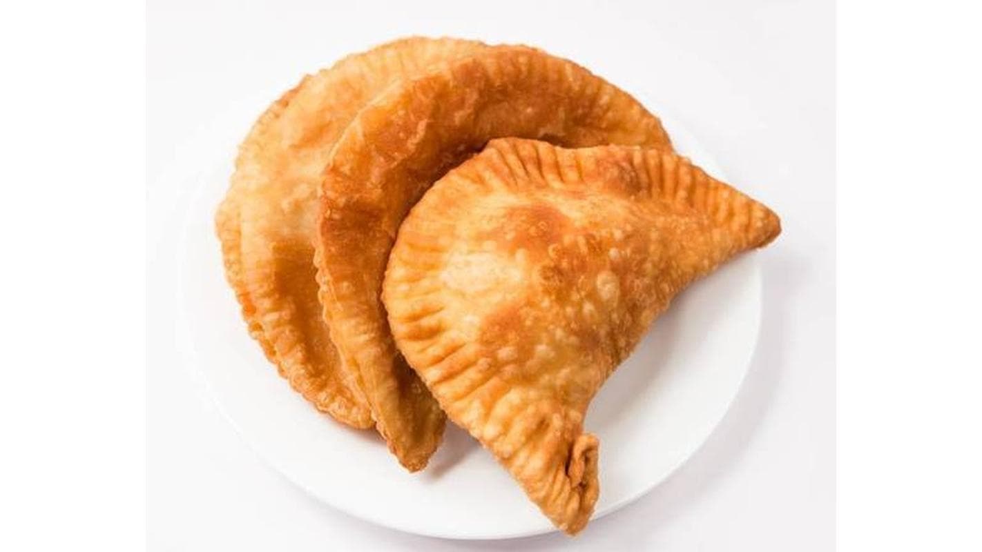 Chicken and Cheese Empanada ( Pollo y Queso ) at Sazón Latino Dominican Kitchen