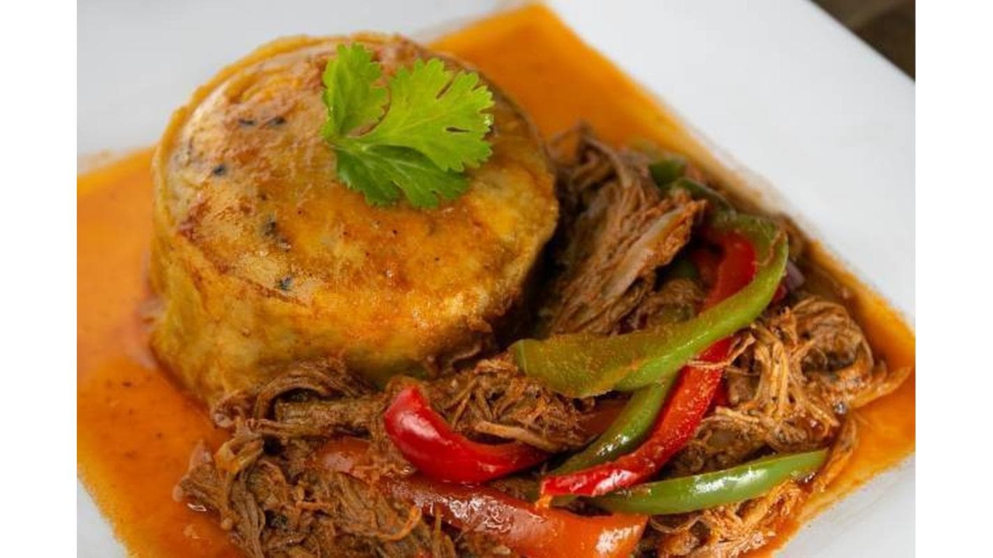 Beef Stew (Mofongo con Res Guisada) at Orgullo Latino Restaurant
