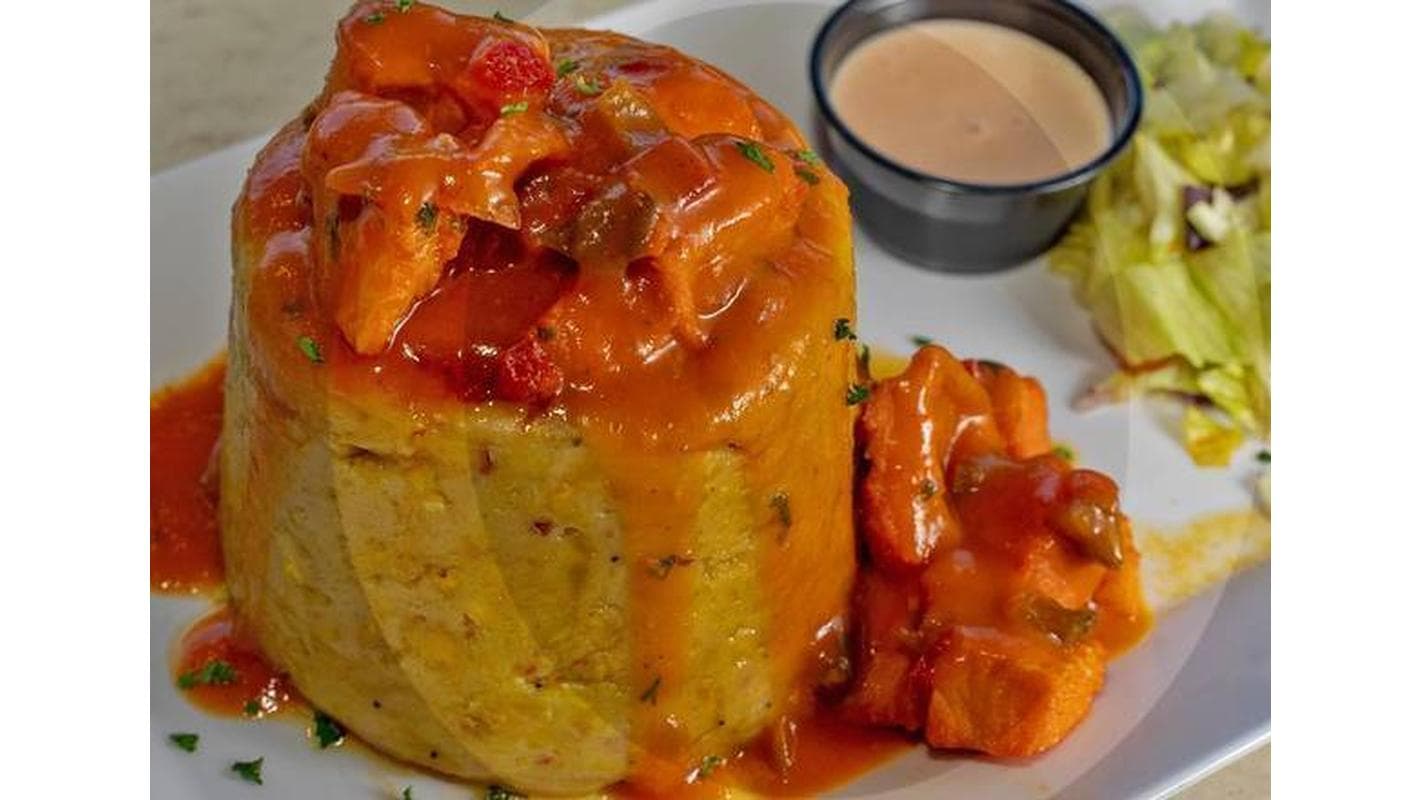 Chicken (Mofongo con Pechuga en Salsa Criolla) at Orgullo Latino Restaurant