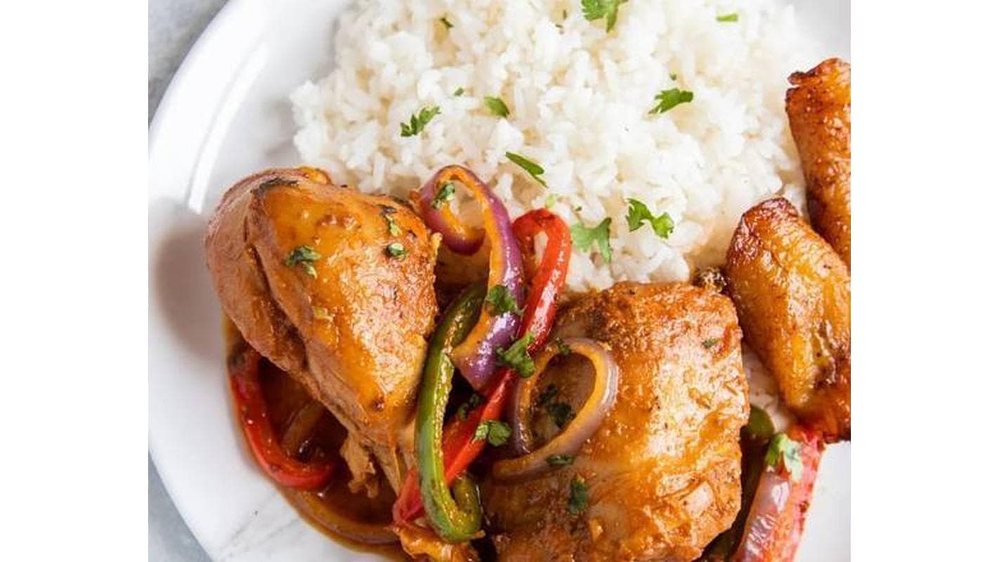 Pollo Guisado ( Stewed Chicken ) at Serie 69 Restaurant & Bar